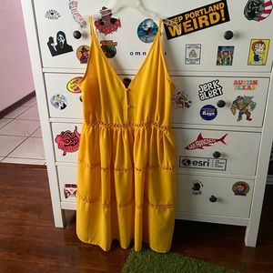 Yellow strapless eyelet dress